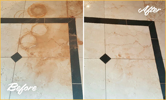 Before and After Picture of a Henderson Hard Surface Restoration Service on a Marble Floor to Eliminate Rust Stains